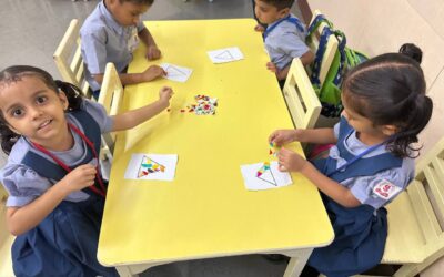 LKG :Triangle shape activityChildren enjoyed the triangle shape activity and participated with great enthusiasm.